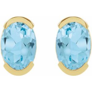 14K Yellow Gold Oval Shape 6 X 4 Mm Natural Sky Blue Topaz Half Bezel Earrings