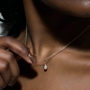 14K Rose Gold 6x4 mm .015 CT Natural Diamond Pendant