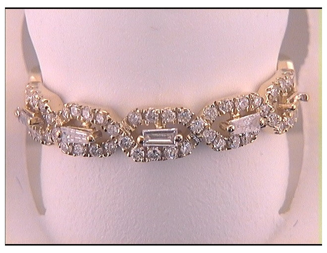 14kt Yellow Gold Womens Baguette Diamond Modern Twist Stackable Band Ring 1/3 Cttw