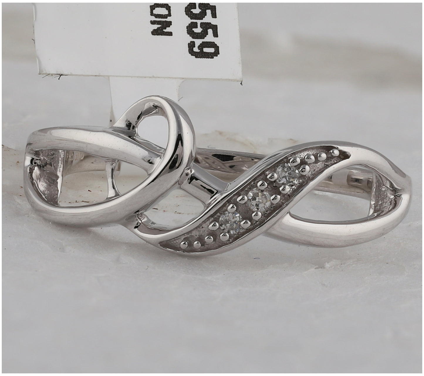 Sterling Silver Womens Round Diamond Twist Fashion Band Ring .03 Cttw, Womens Size: 5-10