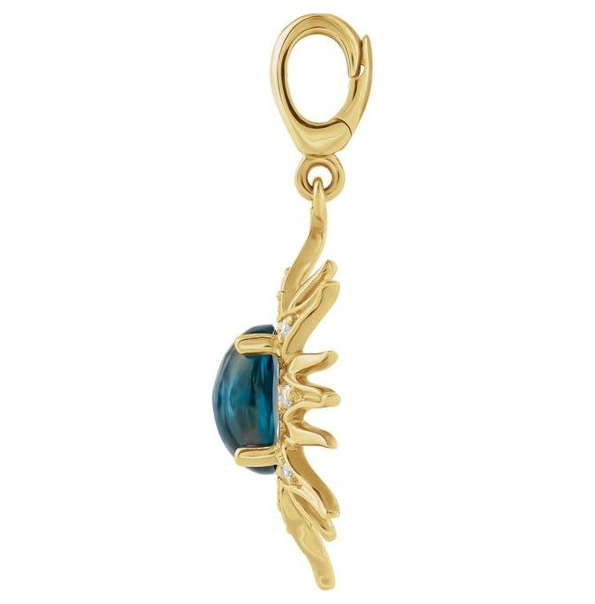 14K Yellow Gold Oval 7 X 5Mm I1, G-H Polished Natural London Blue Topaz Cabochon And 1/10 Ctw Natural Diamond Sun Charm/Pendant